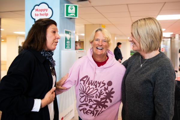 Jersey airport arrivals hall. Two of the rowers of Team Intrepid 232 return to the island following Atlantic 2024 and setting a new world record for the oldest women's fours crew to complete the challenge.         Rosemary Satchwell, Alison Smithurst, Julie Brady and Helene Monpetit finished the 3,000-mile rowing race in 58 days, 12 hours and 30 minutes, the 10th boat in the Women’s Class and 28th in all boats.   Julie Brady (in middle) welcomed by friends                                Picture: ROB CURRIE