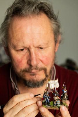 Mark De Gruchy, who takes part in War Gaming. His preferred genres are Napoleonic, World War II and Lord of the Rings.  Painting Napoleonic figures that form part of the French line infantry                 Picture: ROB CURRIE