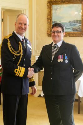 Government House. Medal Presentation to the States of Jersey Police. L>R Vice Admiral Jerry Kyd, Governor of Jersey and Det Const Donna Hewlett - LS&GC Medal                    Picture: ROB CURRIE
