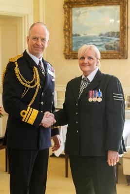 Government House. Medal Presentation to the States of Jersey Police. L>R Vice Admiral Jerry Kyd, Governor of Jersey and Det Sgt Karen Houston - LS&GC Medal                        Picture: ROB CURRIE