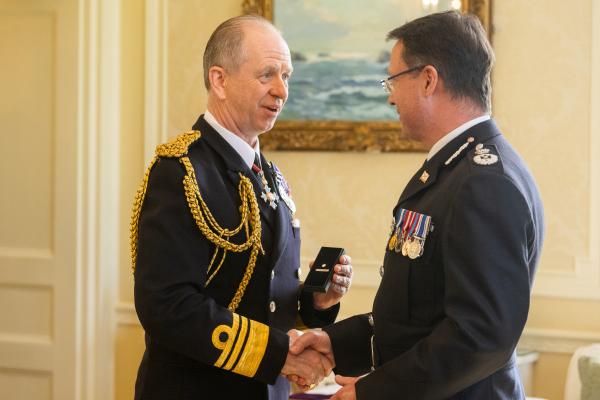 Government House. Medal Presentation to the States of Jersey Police. L>R Vice Admiral Jerry Kyd, Governor of Jersey and Chief Officer Robin Smith - 30 Year LS Clasp                               Picture: ROB CURRIE