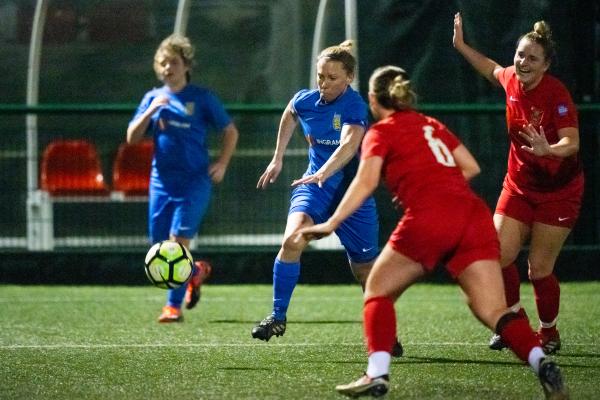 Football at Springfield. Jersey FA Women (blue) vs Army FA Women (red). L>R Jodie Botterill and Emily Ellis                          Picture: ROB CURRIE