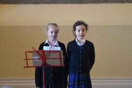 Class 611 Primary School - set prepared reading for 2nd year students - pairs Phoebe Martin and Poppy Bestwick L'Eisteddfod de Jerri - SECTION du Jerriais 2024 Picture: DAVID FERGUSON