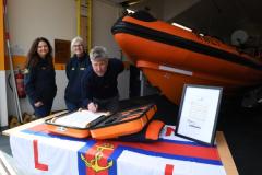 Karen Eeles, Caryll McFayden and Henry Burton RNLI St Catherines Lifeboat Station. The Signing of the 'Connecting our Communities' Scroll Picture: DAVID FERGUSON
