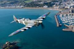 Kelly Frost in the passenger seat of a two seater Spitfire flown by Matt Jones of Spitfires.com Picture: JON GUEGAN