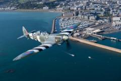 Kelly Frost in the passenger seat of a two seater Spitfire flown by Matt Jones of Spitfires.com Picture: JON GUEGAN