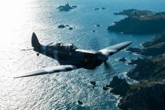 Kelly Frost in the passenger seat of a two seater Spitfire flown by Matt Jones of Spitfires.com Picture: JON GUEGAN