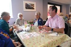 CEO Paul Simmomnds of Age Concern with OAPs at the age concern community centre playing 'Hoi'  - Be My Grandparent/Friend Picture: DAVID FERGUSON
