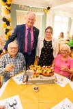 St Ewolds Care Home  celebrating its 30th Birthday with a party for staff, residents and family members. Sitting L>R Jim and Clare Pallett, a married couple who live at the home with standing L>R Simon Crowcroft, constable of St Helier and his wife Angela with the special birthday cake                Picture: ROB CURRIE