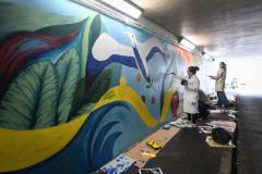 Hautlieu students painting the underpass near the waterfront carpark  Picture: DAVID FERGUSON