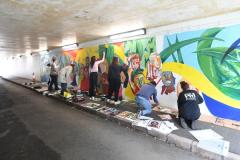 Hautlieu students painting the underpass near the waterfront carpark  Picture: DAVID FERGUSON