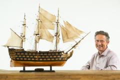 Mike Hill, CEO of Paul Fraser Collectibles (CORRECT SPELLING OF COLLECTIBLES). With a scale model of HMS Victory               Picture: ROB CURRIE