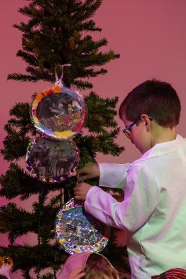 FCJ school KS1 nativity play called Baubles. NO NAMES. Mr Potts attaches a bauble to the Christmas tree                               Picture: ROB CURRIE
