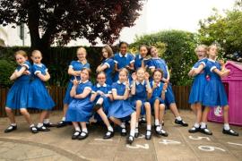 Helvetia House School. Year 6 students recreate their receptionn class photo from 2019. L>R on bench Iris, Malin, Friederike, Xanthe, Zoe     L>R standing Martha (not in original photo), Ophelia, Isla-Fleur, Caitlin, Elodie, Kyana-Mai, Polly, Ella and Millie (not in original photo)                       Picture: ROB CURRIE
