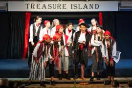 JCP rehearsal of Tresure Island. Evening performances are on Wednesday 19th and Thursday 20th June from 7:00 p.m. Long John Silver, played by Sylvie Demetriou, with his pirates                       Picture: ROB CURRIE