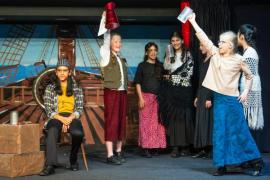 JCP rehearsal of Tresure Island. Evening performances are on Wednesday 19th and Thursday 20th June from 7:00 p.m. Admiral Benbow Bar, Aarvi Parikh as Billy Bones seated on left                      Picture: ROB CURRIE