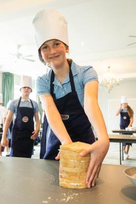 St Brelades Bay hotel. Mont Nicolle pupils  participating in an Hospitality Experience / Nutrition Education Programme with Caring Cooks. Mixing & shaping scones onto trays to be baked in kitchen and
filling & cutting finger sandwiches. Imogen (11)                        Picture: ROB CURRIE