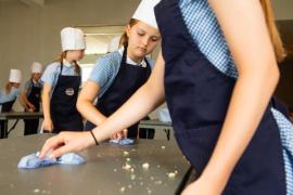St Brelades Bay hotel. Mont Nicolle pupils  participating in an Hospitality Experience / Nutrition Education Programme with Caring Cooks. Mixing & shaping scones onto trays to be baked in kitchen and
filling & cutting finger sandwiches. Cleaning up                       Picture: ROB CURRIE