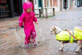 Weather Delila-Rose Darcey (2) having fun in rain puddles in town Picture: JON GUEGAN