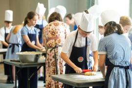 St Brelades Bay hotel. Mont Nicolle pupils  participating in an Hospitality Experience / Nutrition Education Programme with Caring Cooks. Mixing & shaping scones onto trays to be baked in kitchen and
filling & cutting finger sandwiches. Mixing the scone ingredients                        Picture: ROB CURRIE