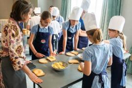 St Brelades Bay hotel. Mont Nicolle pupils  participating in an Hospitality Experience / Nutrition Education Programme with Caring Cooks. Mixing & shaping scones onto trays to be baked in kitchen and
filling & cutting finger sandwiches                        Picture: ROB CURRIE