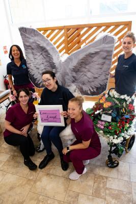 Staff members with some of the chairs Decorated wheelchairs at the Jersey Cheshire Home Picture: JON GUEGAN