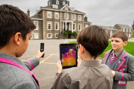 St Michael's school. 2024 Festival of Change,
 an inspiring week-long programme dedicated to sustainability, innovation, and education. Students use thermal imaging cameras to evaluate the school’s energy efficiency, fostering awareness around energy usage and climate impact. L>R Etienne (11), holding thermal imaging camera, Aurelian (11), holding iPad and John (12) holding clipboard and taking notes                    Picture: ROB CURRIE