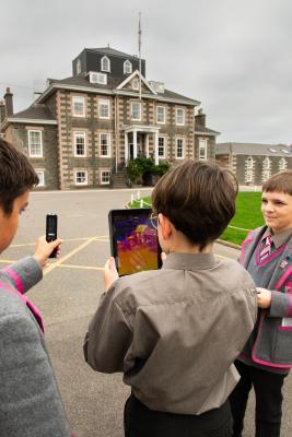 St Michael's school. 2024 Festival of Change,
 an inspiring week-long programme dedicated to sustainability, innovation, and education. Students use thermal imaging cameras to evaluate the school’s energy efficiency, fostering awareness around energy usage and climate impact. L>R Etienne (11), holding thermal imaging camera, Aurelian (11), holding iPad and John (12) holding clipboard and taking notes                    Picture: ROB CURRIE