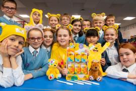 FCJ school. Children in Need. Student Eliana (10) bought Pudsey Bear merchanidise with her own money and then donated it to the school to sell to raise moeny for the Children in Need appeal. Eliana in the yellow shirt with members of the school charity committee                   Picture: ROB CURRIE