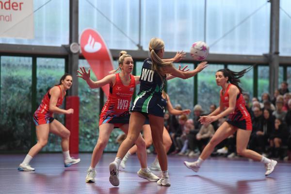 Lynsey Pitman standing up to Daisy Higgins NETBALL Team Jets v Poole Picture: DAVID FERGUSON