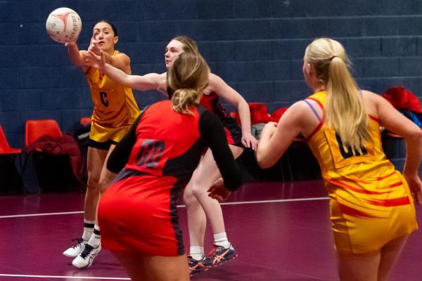 Netball at Les Ormes. St Saviour A (yellow) V Convent C (red). L>R Sam Franco and Bethany Harrison                      Picture: ROB CURRIE