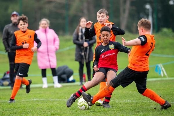 Football at Les Quennevais. Under 12. Rozel (orange) V St Ouen (red). L>R Jayden Yeboah and Tommy Stirling                              Picture: ROB CURRIE