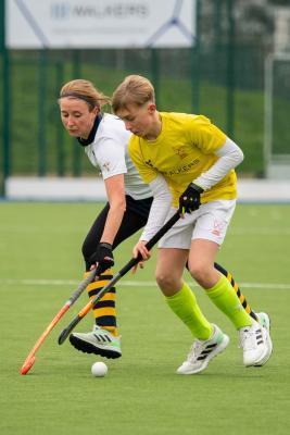 Hockey at Les Quennevais. Quakers (white) V Walkers Dragons (yellow). L>R Gemma Minty (nee Sutton) and Louis Bell                            Picture: ROB CURRIE