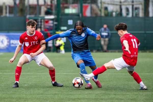 Football at Springfield. Jersey Bulls (red) V Colliers Wood (blue). L>R James Carr, Nicolas Soloman and Miguel Carvalho                       Picture: ROB CURRIE