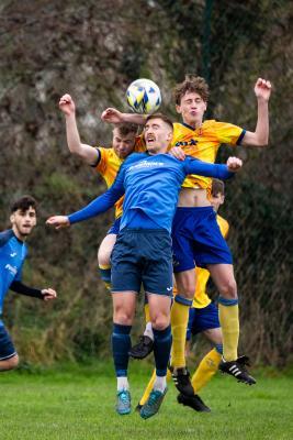 Football at St Clement. St Clement (yellow) V Grouville (blue). L>R Olly Rivers, Kieran Stephens and Alfie Queree                  Picture: ROB CURRIE