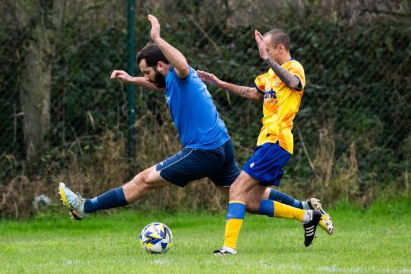 Football at St Clement. St Clement (yellow) V Grouville (blue). L>R Edgar Da Costa and Carl Hinds                  Picture: ROB CURRIE