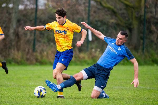 Football at St Clement. St Clement (yellow) V Grouville (blue). L>R Rai Dos Santos and Blake Derbyshire                 Picture: ROB CURRIE
