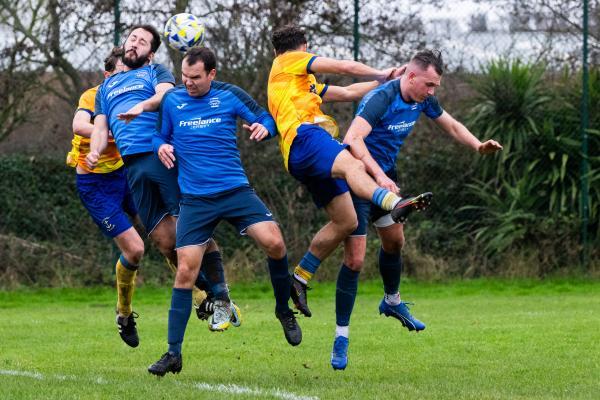Football at St Clement. St Clement (yellow) V Grouville (blue). NO NAMES                 Picture: ROB CURRIE
