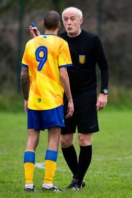 Football at St Clement. St Clement (yellow) V Grouville (blue). L>R Carl Hinds and Andy Norman, referee                  Picture: ROB CURRIE