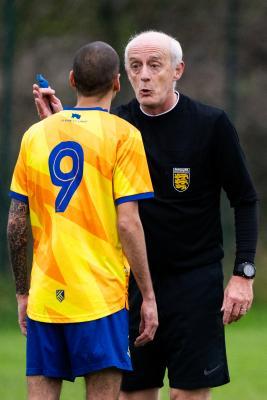 Football at St Clement. St Clement (yellow) V Grouville (blue). L>R Carl Hinds and Andy Norman, referee                  Picture: ROB CURRIE