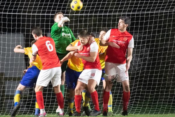 Football JFA Combination, Jersey FA Cup quarter-final: St Peter v St Clement  Goalie clears with a punch Picture: JON GUEGAN