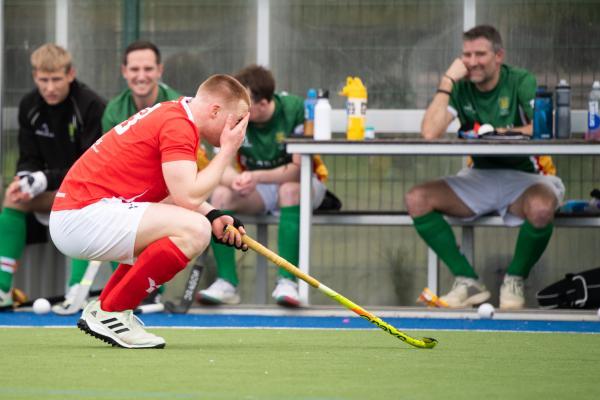 Mens hockey inter-insular Jamie Watling takes a ball in the face  Picture: JON GUEGAN