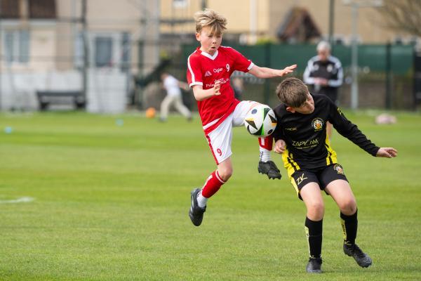 Football at FB Fields. Jersey Primary schools football festival. Jersey A (red) V Gloucester A (black). L>R Teijo Boletta and Harry Eckford                            Picture: ROB CURRIE