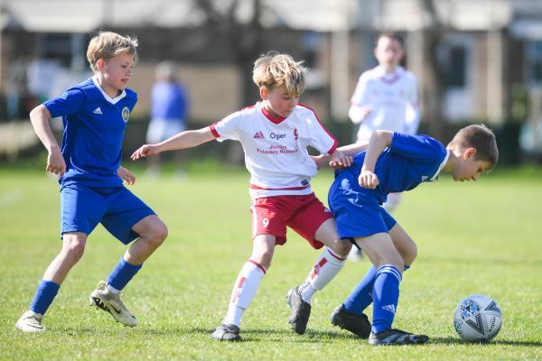 Jersey's Teijo Boletta contesting the ball against St Albans Max Gibbons Primary Schools Football Jersey A v St Albans Yellow Picture: DAVID FERGUSON