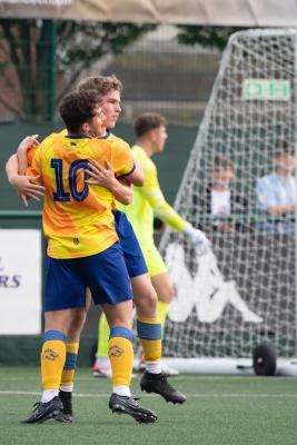 Football Wheway Memorial Trophy Final  St Clement v St Peter St Clement's first goal scored by Charlie Yates celebrating with Jay Dos Santos Picture: JON GUEGAN