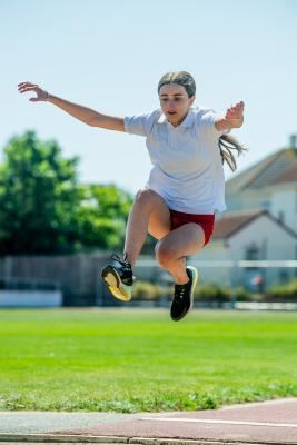 Athletics at the track at FB Fields. Schools athletics cup - girls year 7/8 & 9/10.  Long Jump. Emily Davy (14) from Le Rocquier                            Picture: ROB CURRIE