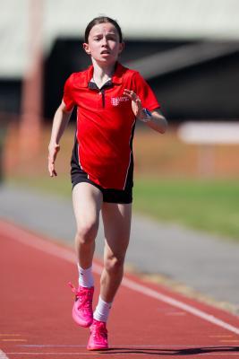 Athletics at the track at FB Fields. Schools athletics cup - girls year 7/8 & 9/10. 1,500m. Florence Williams (12) of JCG won her race. About 50m from the finish line on last lap                             Picture: ROB CURRIE