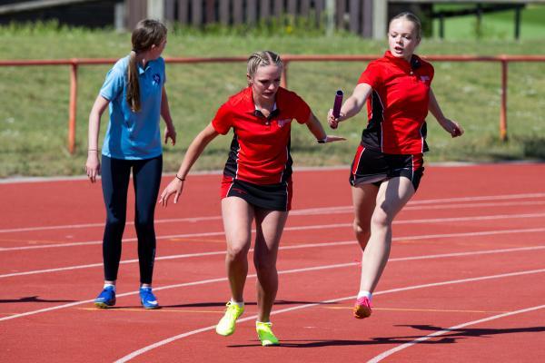 Athletics at the track at FB Fields. Schools athletics cup - girls year 9/10 4 x 100m relay, last leg changeover. JCG who won. NO NAMES                              Picture: ROB CURRIE
