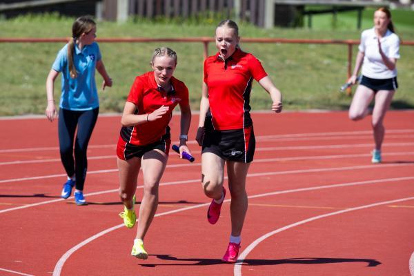 Athletics at the track at FB Fields. Schools athletics cup - girls year 9/10 4 x 100m relay, last leg changeover. JCG who won. NO NAMES                              Picture: ROB CURRIE