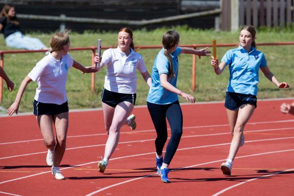 Athletics at the track at FB Fields. Schools athletics cup - girls year 9/10 4 x 100m relay, last leg changeover                                 Picture: ROB CURRIE